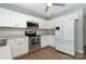 Modern kitchen with stainless steel appliances and light wood laminate flooring at 1630 Hardy Dr, Rock Hill, SC 29732