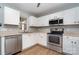 Modern kitchen with white cabinets and stainless steel appliances at 1630 Hardy Dr, Rock Hill, SC 29732