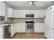 Well-equipped kitchen featuring white cabinets and stainless steel appliances at 1630 Hardy Dr, Rock Hill, SC 29732