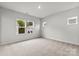 Neutral bedroom with plush carpet, and bright windows at 1750 Blanche St, Charlotte, NC 28262