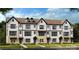 Modern townhome exterior with white siding, black trim, and well-manicured landscaping at 1750 Blanche St, Charlotte, NC 28262