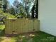 View of the wood backyard fence with a single gate offering privacy and security for outdoor activities at 211 Chestnut St, Shelby, NC 28150