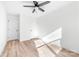 Bright, airy bedroom features wood floors, white walls, and two entry doors at 211 Chestnut St, Shelby, NC 28150