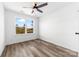 Bright bedroom with hardwood floors, natural lighting and a large window at 211 Chestnut St, Shelby, NC 28150