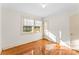 Simple bedroom with hardwood floors and a window at 223 W 9Th St, Newton, NC 28658