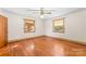 Spacious bedroom with hardwood floors and two windows at 223 W 9Th St, Newton, NC 28658