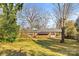 Brick house exterior with a large backyard at 223 W 9Th St, Newton, NC 28658