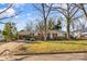 Brick ranch house with a carport and yard at 223 W 9Th St, Newton, NC 28658