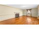 Hardwood floors and fireplace in spacious living room at 223 W 9Th St, Newton, NC 28658