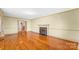 Hardwood floors and fireplace in spacious living room at 223 W 9Th St, Newton, NC 28658