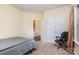 Spacious bedroom with double doors leading to another room and a large window at 2548 Flintshire Ln, Gastonia, NC 28056