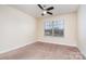 Bright bedroom with neutral carpeting and window at 2548 Flintshire Ln, Gastonia, NC 28056