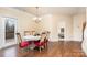 Bright dining room with hardwood floors and access to deck at 2548 Flintshire Ln, Gastonia, NC 28056