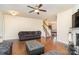 Open living room with hardwood floors and view of staircase at 2548 Flintshire Ln, Gastonia, NC 28056