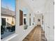 Light-filled hallway with courtyard views and rug at 324 Patternote Rd, Mooresville, NC 28117