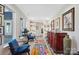 Bright hallway with seating area and built-in shelves at 324 Patternote Rd, Mooresville, NC 28117