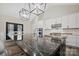 Modern kitchen with expansive black countertop island at 324 Patternote Rd, Mooresville, NC 28117