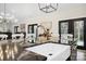 Kitchen island with farmhouse sink, stylish faucet, and ample counter space at 324 Patternote Rd, Mooresville, NC 28117