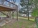 Backyard with deck and stairs leading up at 3453 Selwyn Ave, Charlotte, NC 28209