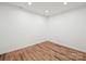 Empty bonus room with hardwood floors and recessed lighting at 3453 Selwyn Ave, Charlotte, NC 28209