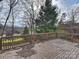 Deck overlooking backyard and trees at 3453 Selwyn Ave, Charlotte, NC 28209