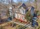 Two-story house with brick and siding exterior, landscaping, and driveway at 355 Sardis Rd N Alt Rd, Charlotte, NC 28270