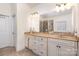 Double vanity bathroom with a large mirror and shower at 355 Sardis Rd N Alt Rd, Charlotte, NC 28270