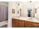 Bathroom with double vanity, large mirror, and shower/tub combo at 355 Sardis Rd N Alt Rd, Charlotte, NC 28270