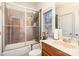 Small bathroom with tub/shower combo and wood vanity at 355 Sardis Rd N Alt Rd, Charlotte, NC 28270