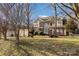 Two-story house with brick and siding exterior, landscaping, and a tree-lined lawn at 355 Sardis Rd N Alt Rd, Charlotte, NC 28270