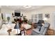 Cozy Gathering room with fireplace, comfortable seating, and large windows at 355 Sardis Rd N Alt Rd, Charlotte, NC 28270