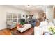 Bright and airy living room with hardwood floors and access to the kitchen at 355 Sardis Rd N Alt Rd, Charlotte, NC 28270