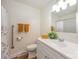 Main bathroom with white vanity and walk-in shower at 4201 Westridge Dr, Charlotte, NC 28208