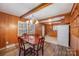 Dining area adjacent to kitchen with wood features at 4201 Westridge Dr, Charlotte, NC 28208