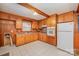 Kitchen with wood cabinets and tile flooring at 4201 Westridge Dr, Charlotte, NC 28208