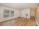 Living room with hardwood floors and large windows at 4201 Westridge Dr, Charlotte, NC 28208