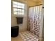 Bathroom with shower, bathtub, and linen closet at 511 W Stevens Dr, Kershaw, SC 29067