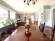 Bright dining room with wood table and chairs at 511 W Stevens Dr, Kershaw, SC 29067