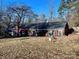 Brick house with large backyard and mature trees at 511 W Stevens Dr, Kershaw, SC 29067