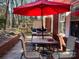 Brick patio with seating area and grill at 511 W Stevens Dr, Kershaw, SC 29067