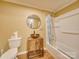 Updated bathroom features a shower/tub combo, vanity with vessel sink, and toilet at 523 Fox Ave, Chester, SC 29706