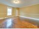 Charming bedroom with hardwood floors and neutral walls at 523 Fox Ave, Chester, SC 29706