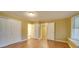 Bedroom with hardwood floors, neutral walls and en-suite bathroom at 523 Fox Ave, Chester, SC 29706