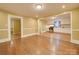 Kitchen features white cabinets, stainless steel appliances, and hardwood floors at 523 Fox Ave, Chester, SC 29706