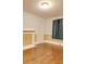 Living room with hardwood floors, fireplace and window at 523 Fox Ave, Chester, SC 29706