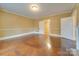 Hardwood floor living room with doors to other rooms at 523 Fox Ave, Chester, SC 29706