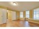 Spacious living room with hardwood floors and large windows at 523 Fox Ave, Chester, SC 29706