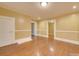 Living room with hardwood floors and access to other rooms at 523 Fox Ave, Chester, SC 29706