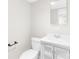 Clean bathroom with white vanity and a modern toilet at 526 S Green St, Statesville, NC 28677