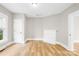 Living room features light wood floors and a white fireplace at 526 S Green St, Statesville, NC 28677